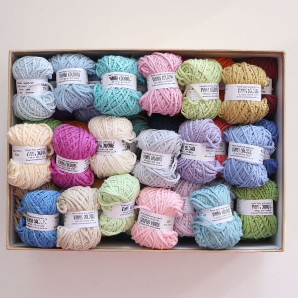 Balls of wool and mohair for knitting in pastel colors Stock Photo by Irrin